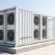erized battery storage system installed on a concrete pad, reflecting modern commercial 1mw battery storage cost trends.