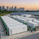 A containerized all-in-one liquid cooled LFP BESS asset managed by a renewable energy project management framework.