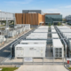 Large-scale outdoor solar farm battery storage container installation optimized for utility grid management.