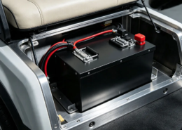 A 48v golf cart batteries pack retrofitted in the aluminum battery bay under the seat of a custom electric vehicle