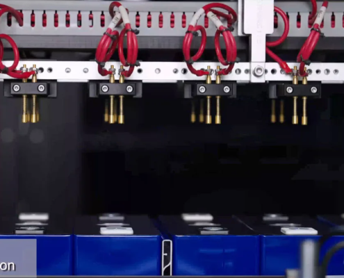 Industrial scale LiFePO4 energy storage cabinet system installed inside an energy station.
