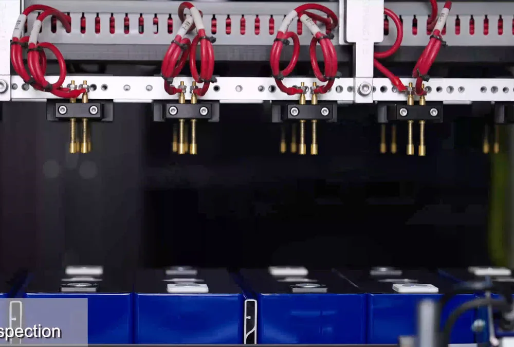 Industrial scale LiFePO4 energy storage cabinet system installed inside an energy station.