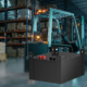 Heavy-duty electric forklift powered by Lithium iron phosphate batteries operating in a busy distribution center